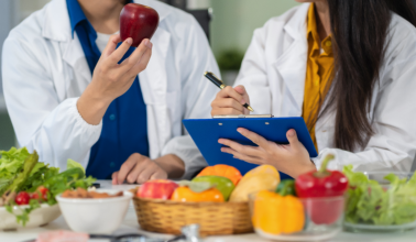 two dieticians with fruits and vegetables